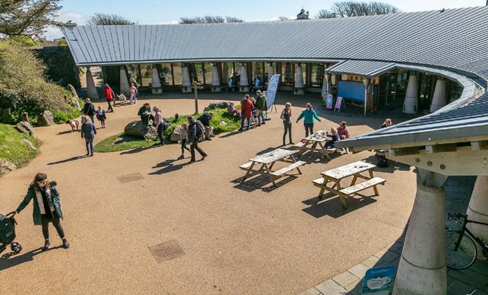 Visitors milling around outside Oriel y Parc National Discovery Centre